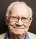 Home 22 Life Settlement - Senior man smiling in portrait.