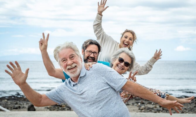 Selling Your Life Insurance policy: Group of happy seniors having fun.