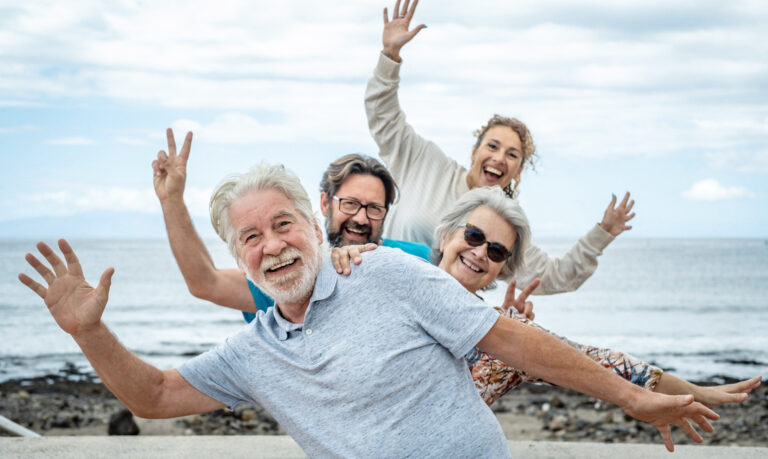 Selling Your Life Insurance Policy: Group of happy seniors having fun.