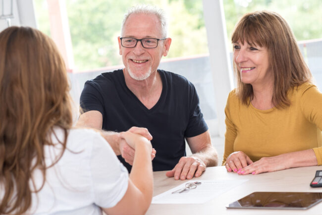 How to Sell Life Insurance:Senior couple meeting advisor How to Sell Life Insurance: Senior couple meeting advisor