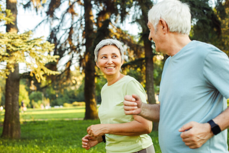 Selling Your Life Insurance Policy: Senior couple running