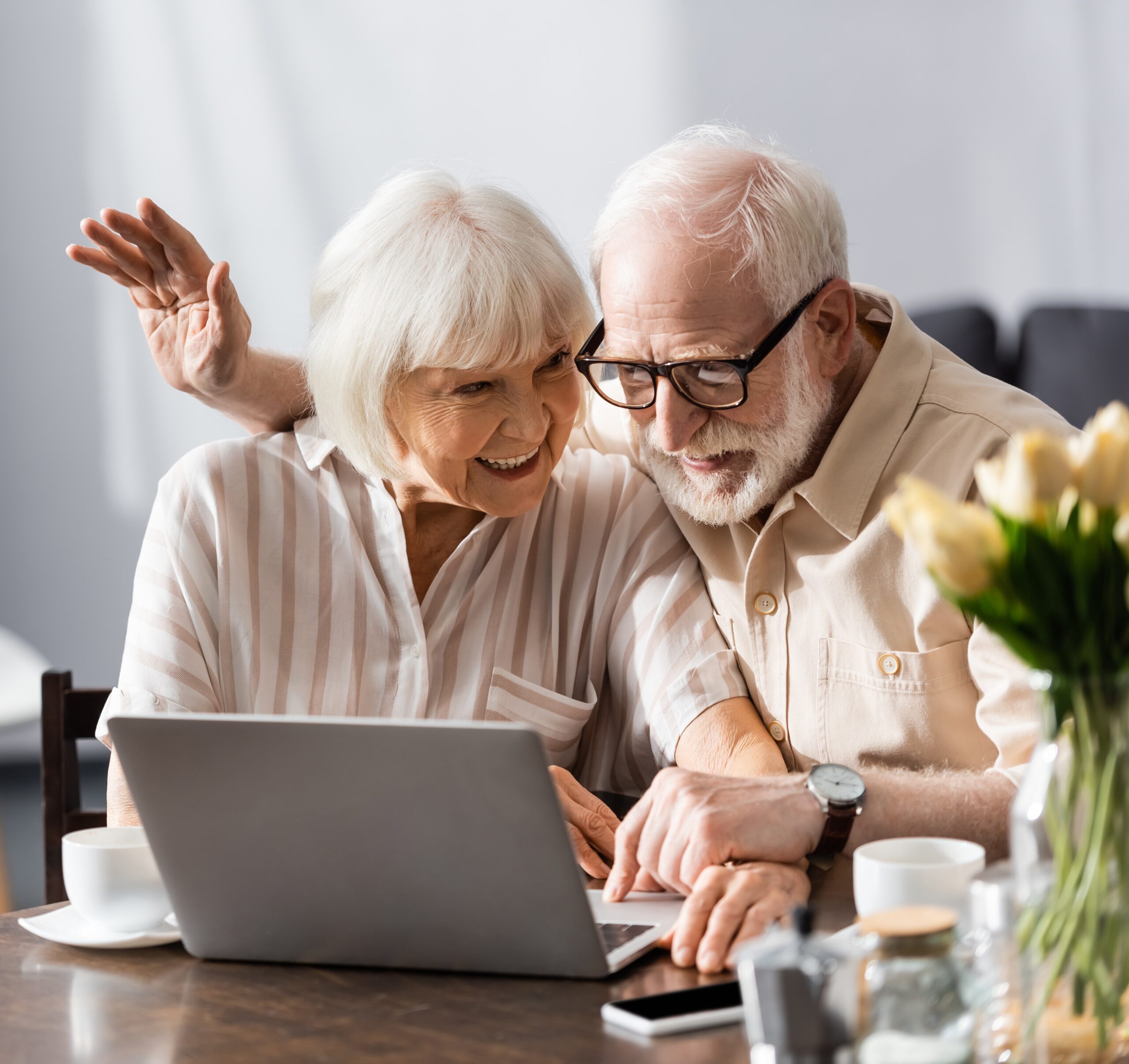 life insurance policy buyers: senior couple reviewing life settlement options